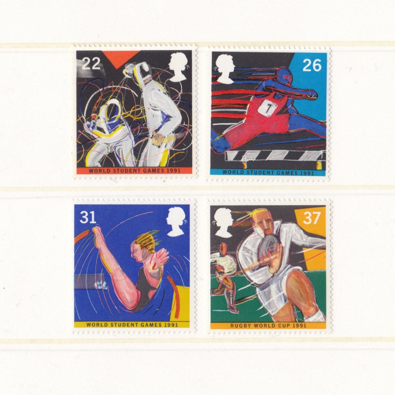 Four postage stamps featuring sports illustrations on a white background