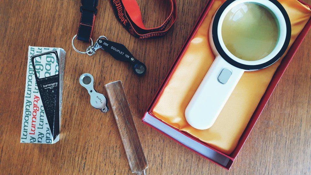 different types of magnifying glasses including handheld with led and small loupes