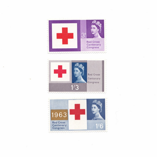 Three vintage stamps featuring a red cross design on a white background