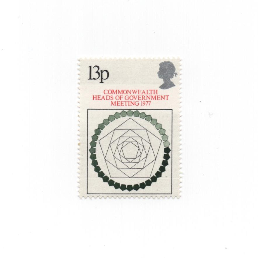 Stamp with geometric design and text on a white background