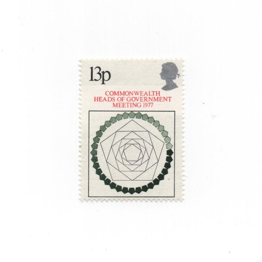Stamp with geometric design and text on a white background