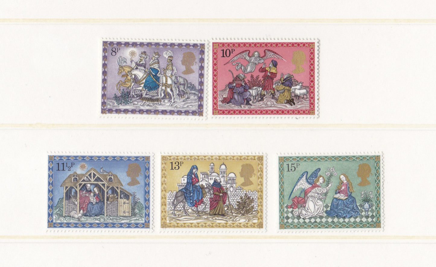 christmas illustrations in different focal colours on postage stamps on a white background