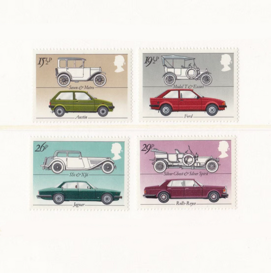 Set of stamps featuring vintage cars on a white background