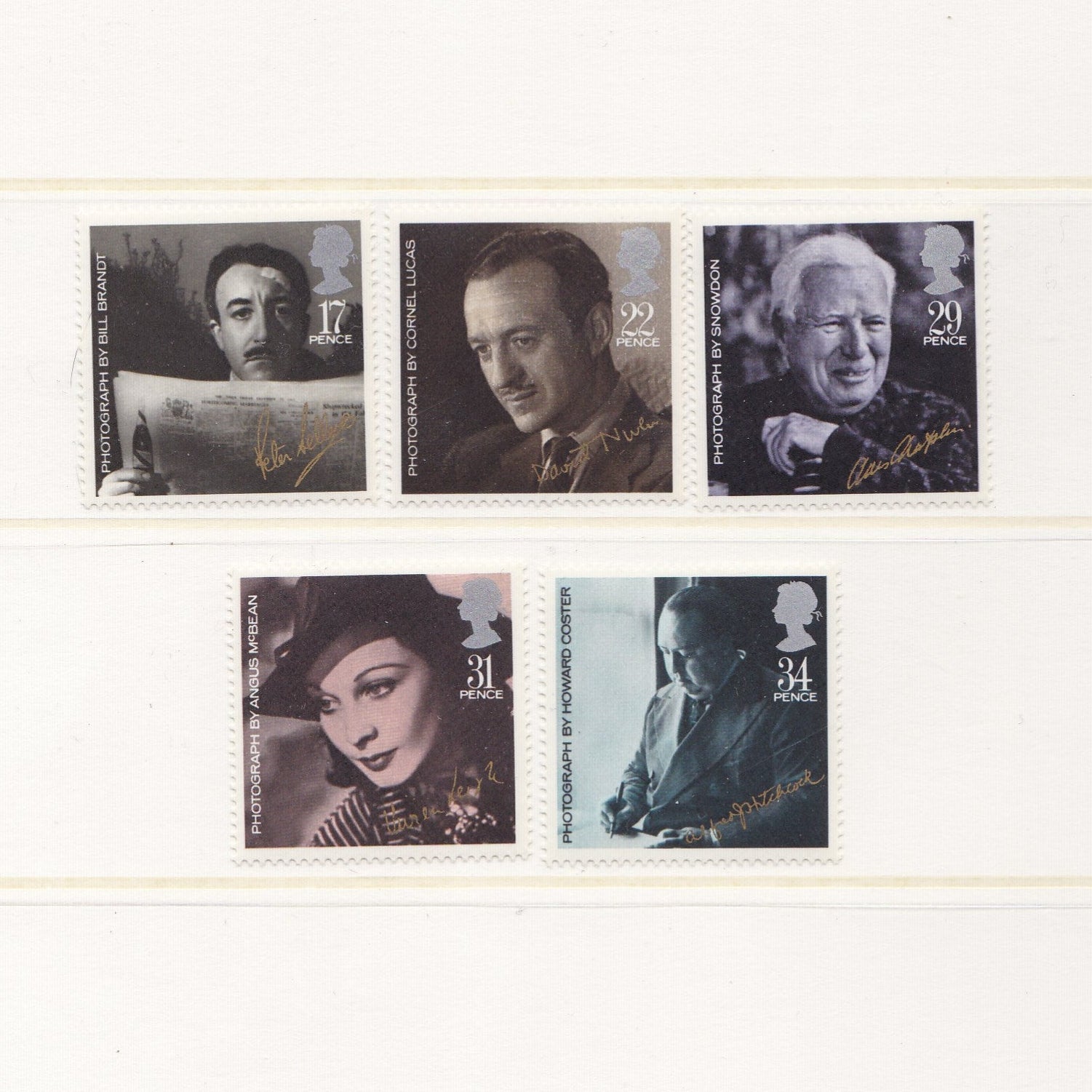 Black and white images of actors, actresses and film producers on postage stamps