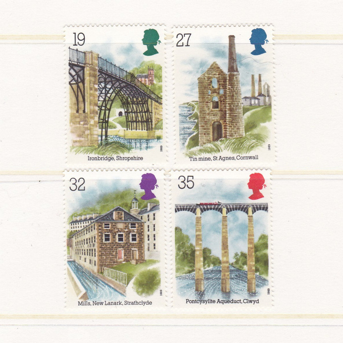 Four illustrated stamps featuring different landmarks with scenic backgrounds.