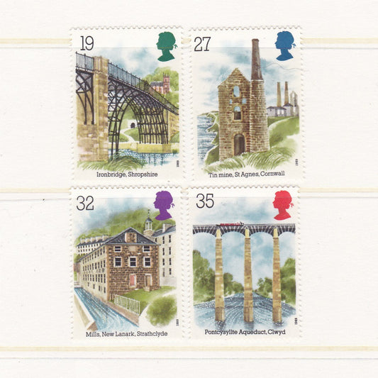 Four illustrated stamps featuring different landmarks with scenic backgrounds.