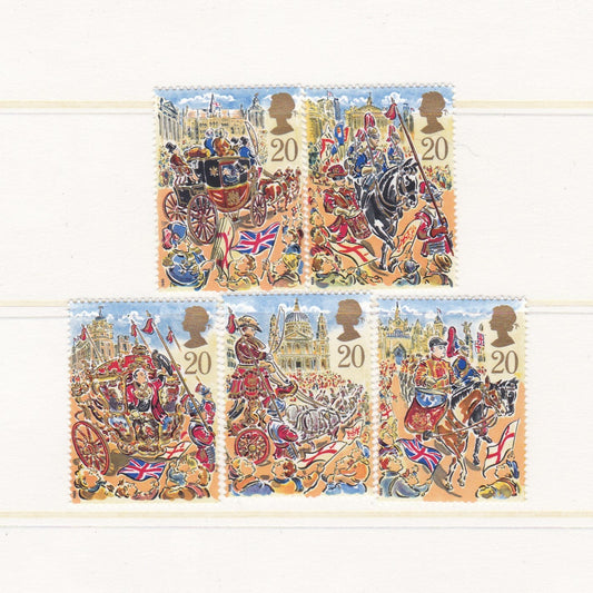 Set of four postage stamps featuring historical scenes and British flags on a white background.