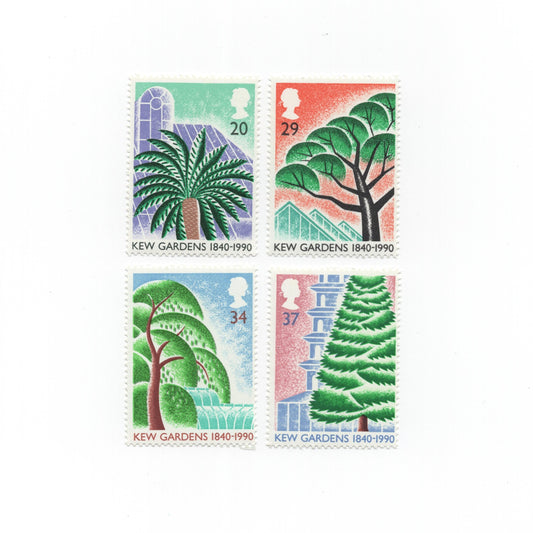 Four colorful stamps featuring trees and architectural elements on a white background