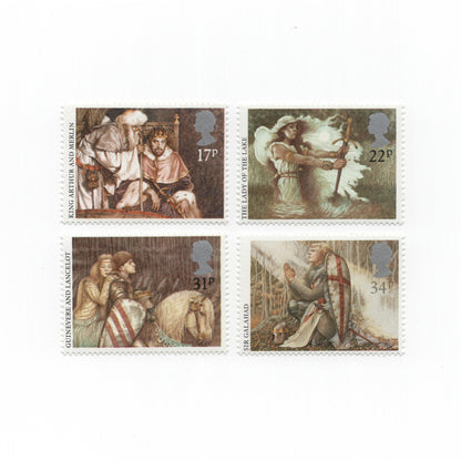 Four historical postage stamps with illustrations on a white background