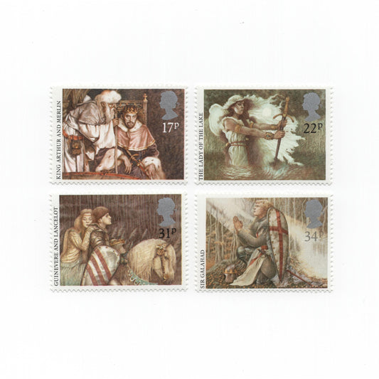 Four historical postage stamps with illustrations on a white background