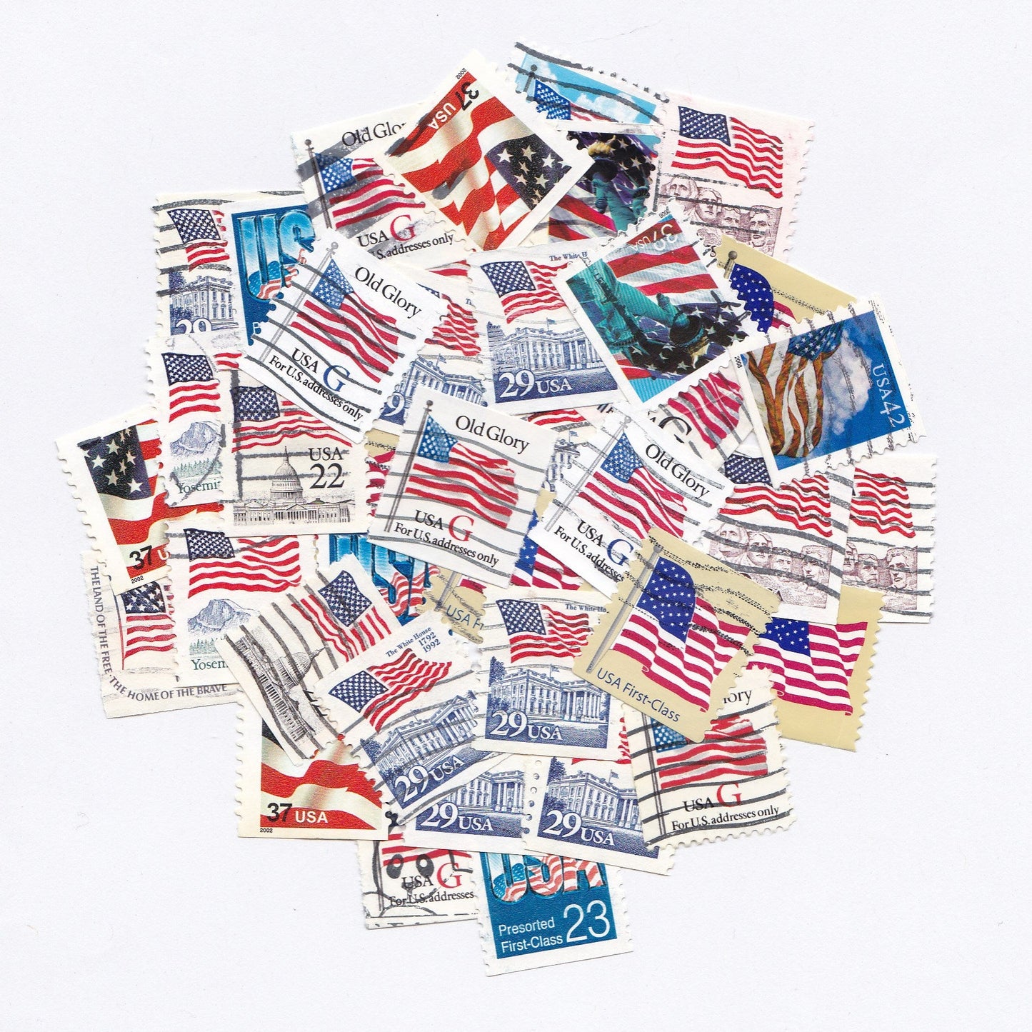 Collection of U.S. postage stamps featuring various designs on a white background